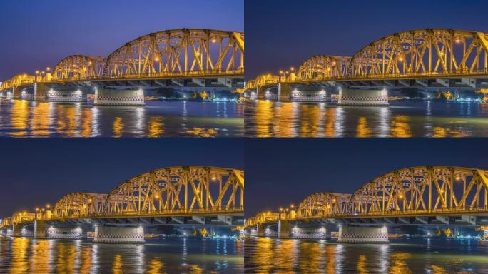 夜间在Krung Thep桥上的城市交通。Krung Thep桥位于泰国曼谷。黄昏时间流逝。高质量镜