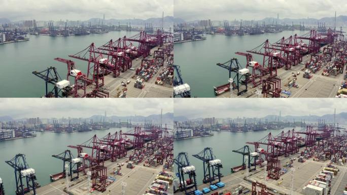 在香港维多利亚港乘起重机运往港口。鸟瞰图无人机4k镜头。