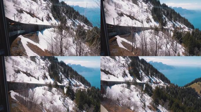 雪山中的齿轮火车。火车在陡峭的山区上坡行驶。瑞士，阿尔卑斯山