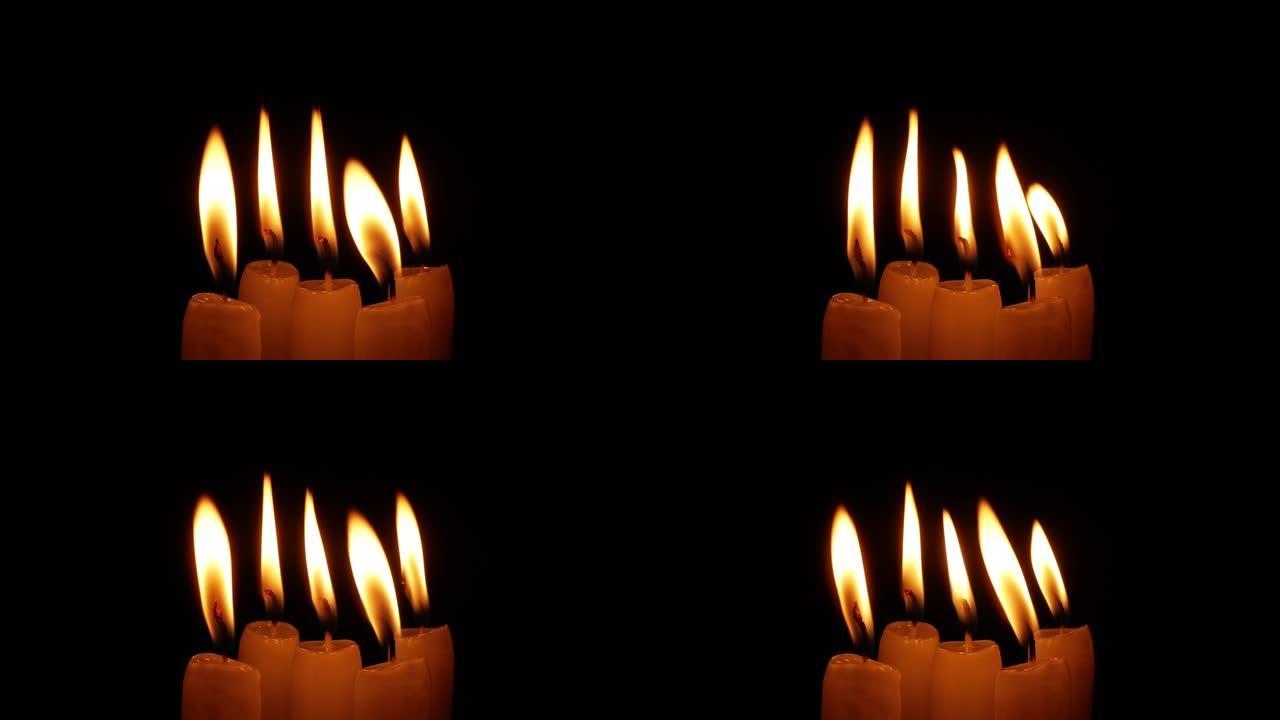 蜡烛在黑暗中点燃