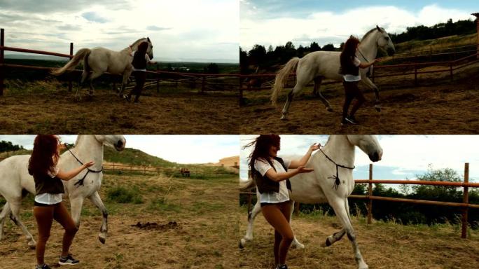 一个女人带着一匹马在围场里奔跑。