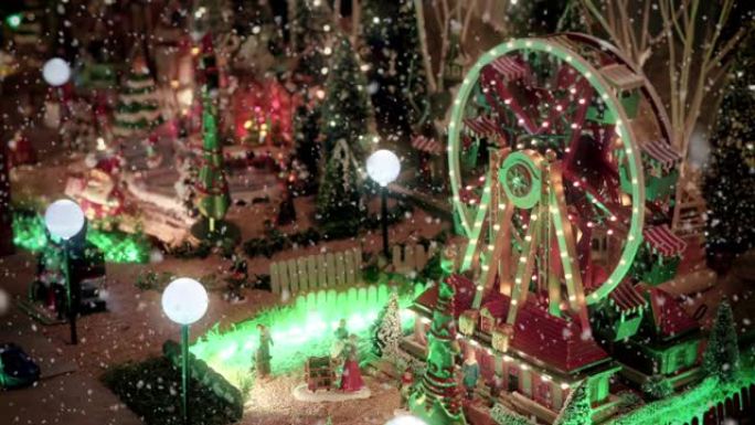 雪下有摩天轮的商店里的圣诞村场景-特写-圣诞活动概念