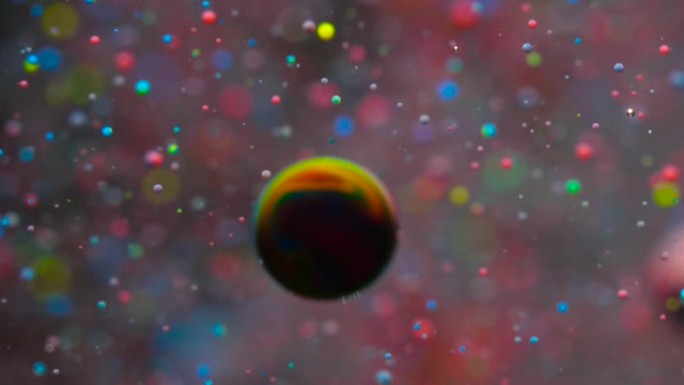 彩色气泡油美丽油漆多色宇宙移动。太空星系行星。星云太空恒星行星。银河系。表面宇宙在移动。明亮的节日背