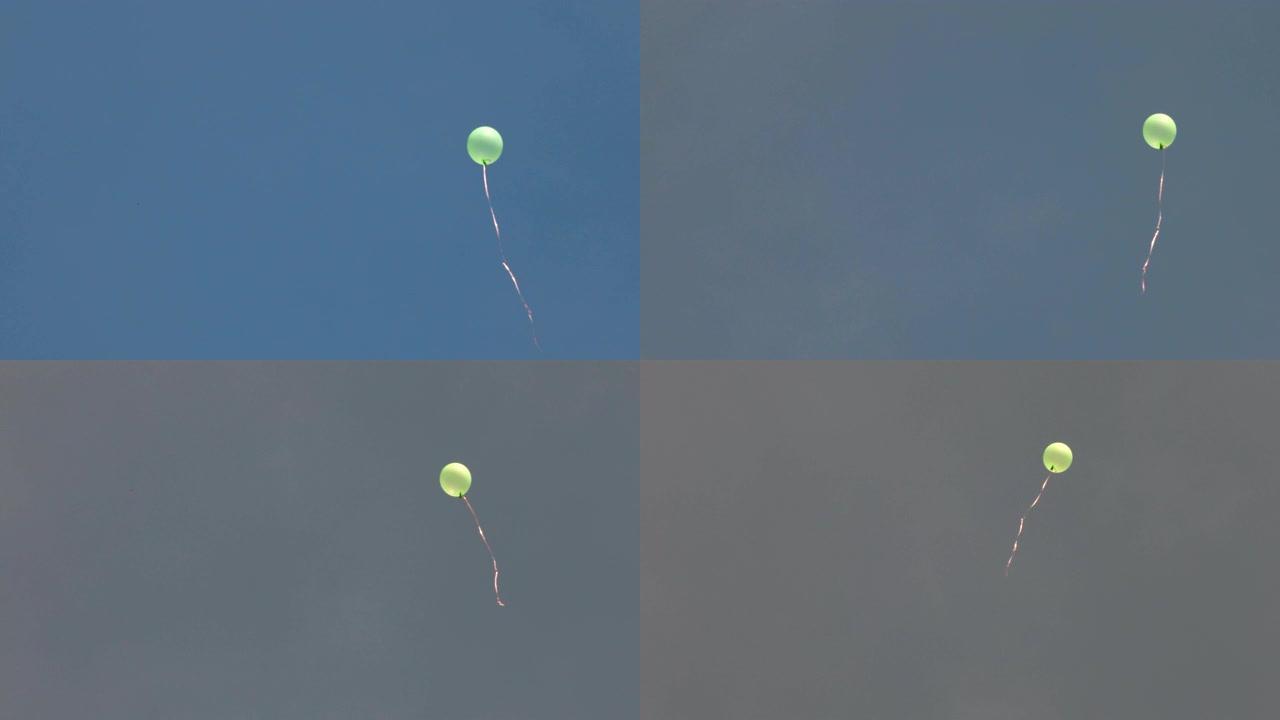 丢失的绿色气球飞上天空。