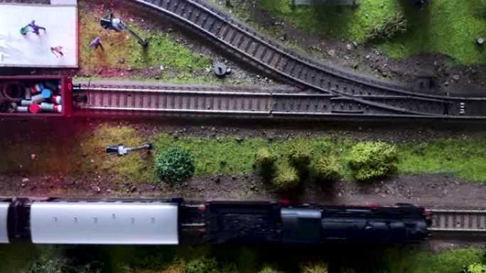 蒸汽机车的移动模型的俯视图。peron和火车站的详细模型。缩略图特写