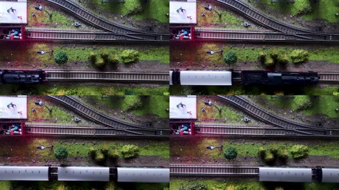 蒸汽机车的移动模型的俯视图。peron和火车站的详细模型。缩略图特写