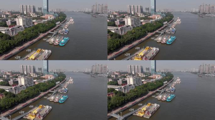 堤防在广州。海岸附近有许多船。