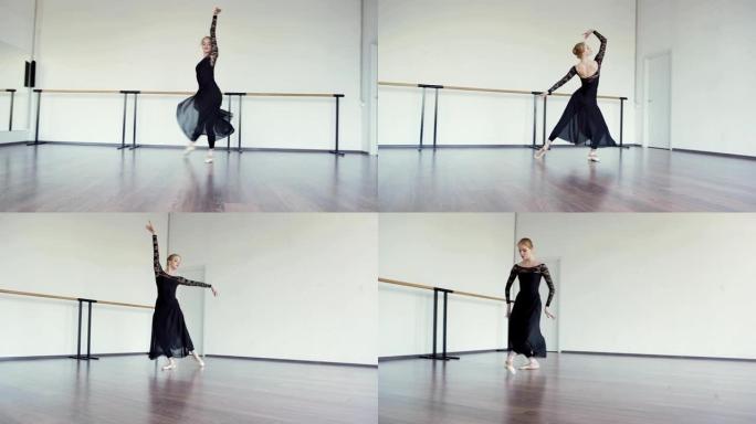 穿着黑色蕾丝紧身衣、长裙和尖头鞋的专业芭蕾舞演员在芭蕾舞工作室排练舞蹈