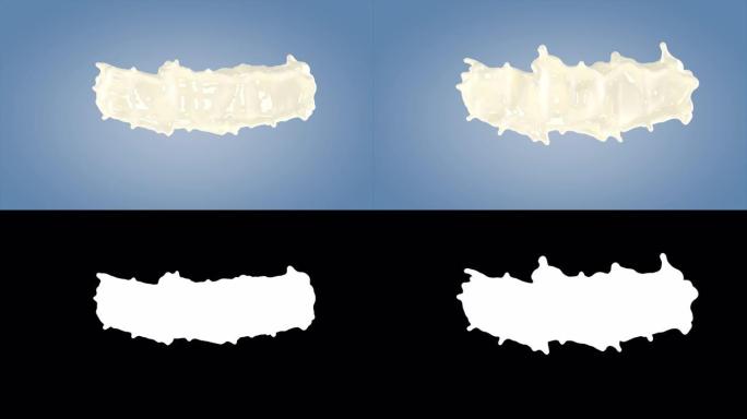 完美形状的牛奶飞溅孤立在蓝色背景上。