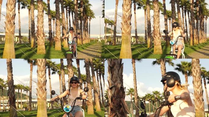 旅游女性乘坐电动自行车游览城镇