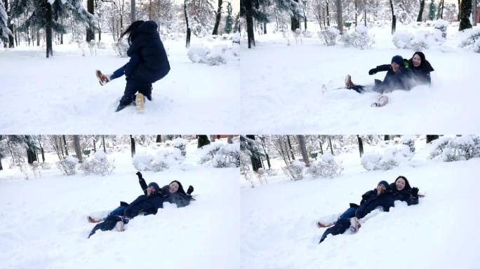 快乐的夫妇在冬季森林里打雪仗和在雪地里玩得开心