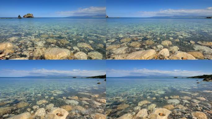 卵石底透明海水，海滩全景