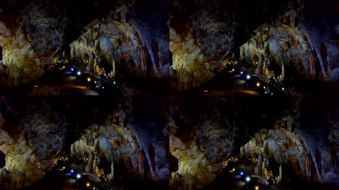 运动到被彩色灯照亮的洞穴天花板