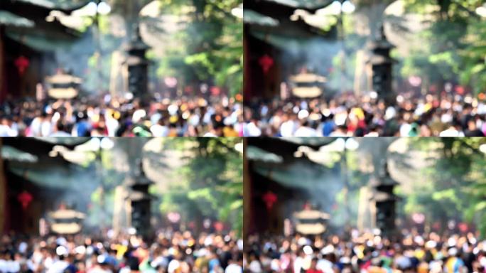 在中国浙江普陀山普济寺散步的拥挤人群和团体游客的模糊运动，4k镜头，慢动作。