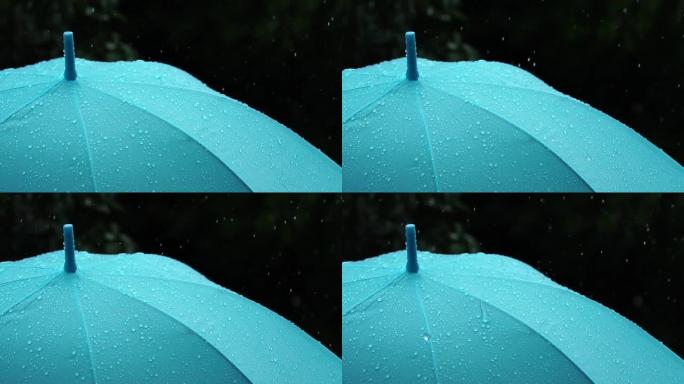 雨水从雨伞上掉下来