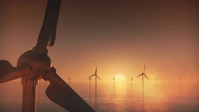 旭日背景下的海上风力涡轮机。