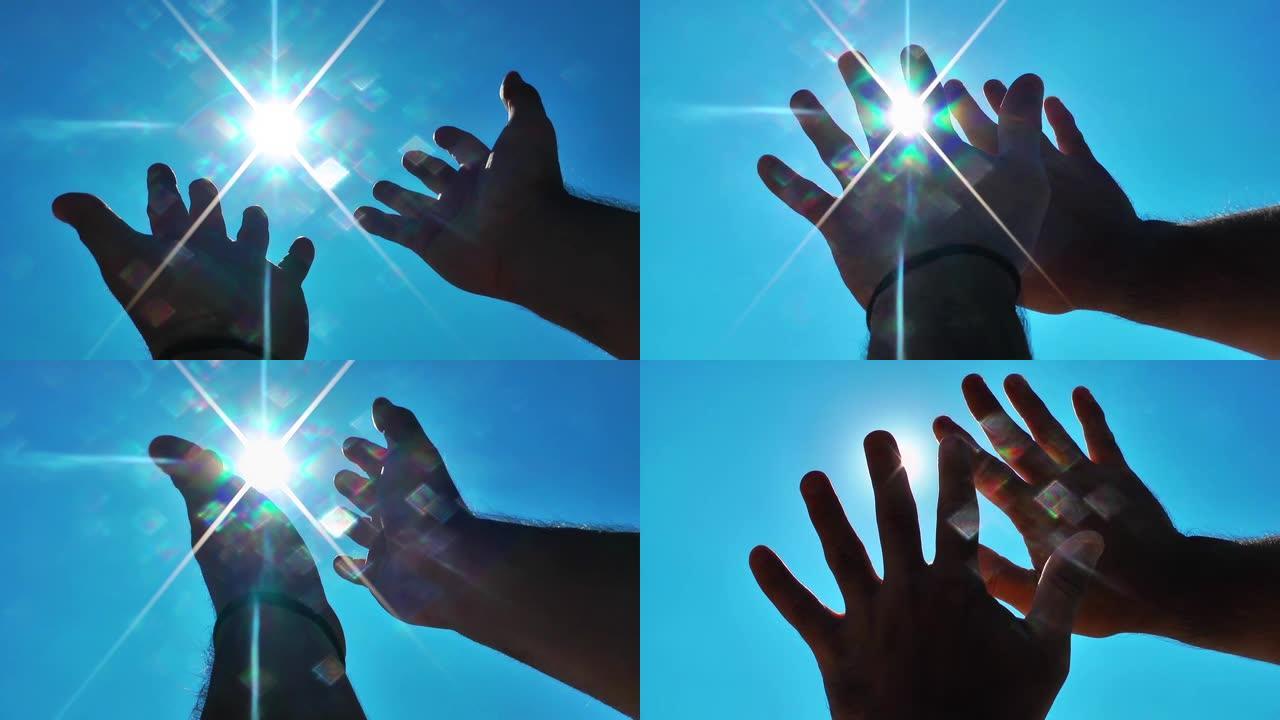太阳和男性的手