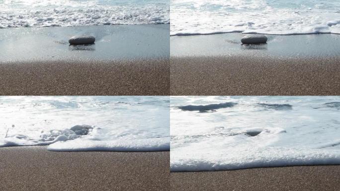 海浪在塞浦路斯的海滩上坠落