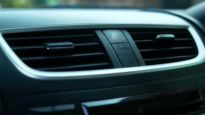 驾驶员按下遥控器锁定汽车后，汽车仪表板上的防盗警报器指示灯起作用。技术和运输概念。