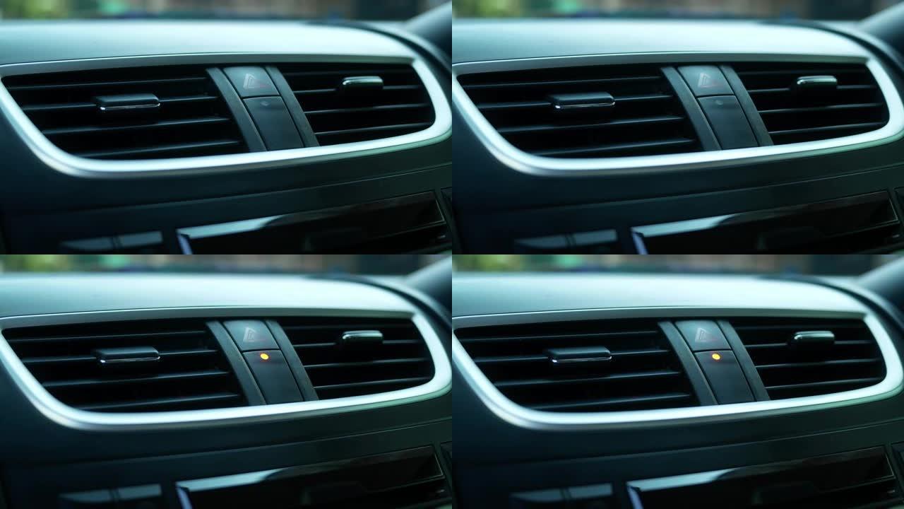 驾驶员按下遥控器锁定汽车后，汽车仪表板上的防盗警报器指示灯起作用。技术和运输概念。