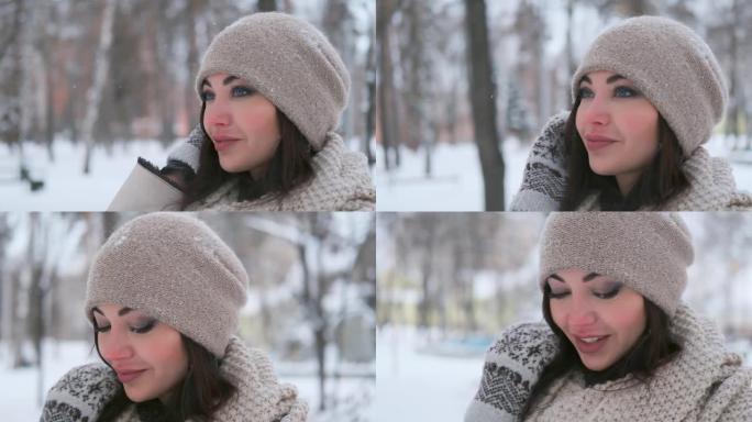 冬天公园里，一个戴着深色头发的美丽女孩的肖像站在公园里，微笑着可爱。慢动作