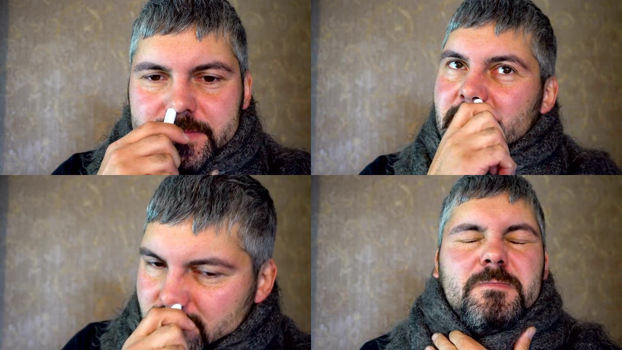 一个留着胡须的病人通过鼻子吸入药物