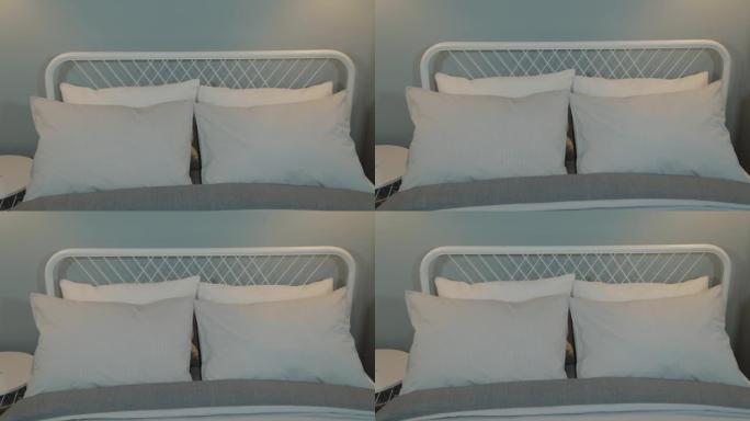 现代室内床上时尚的白色枕头