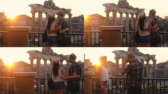 年轻夫妇游客在日出时看着罗马广场。从全景的角度来看，意大利罗马的历史帝国罗马罗马。