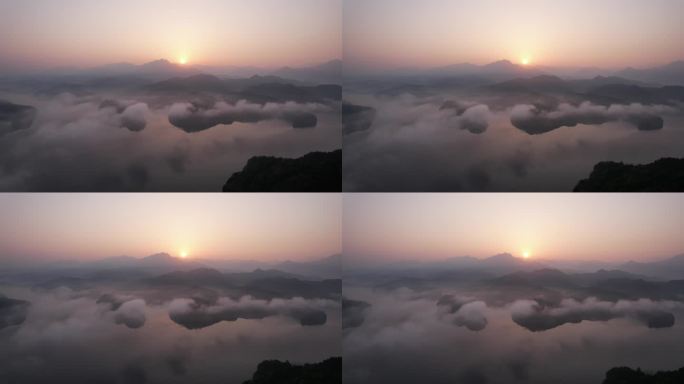 早晨湖边云雾缭绕的日出