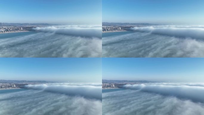 航拍威海西海岸上空的平流雾云瀑