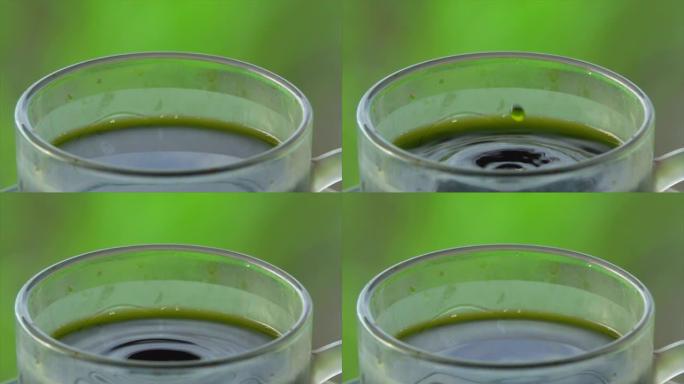 绿茶滴在杯子上慢动作