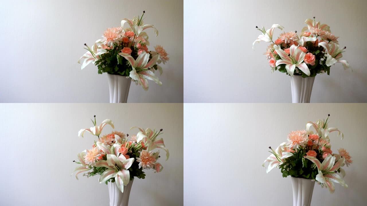 白色背景上粉红色花瓶中的百合，玫瑰，康乃馨花朵正在旋转。粉彩花卉系列展示