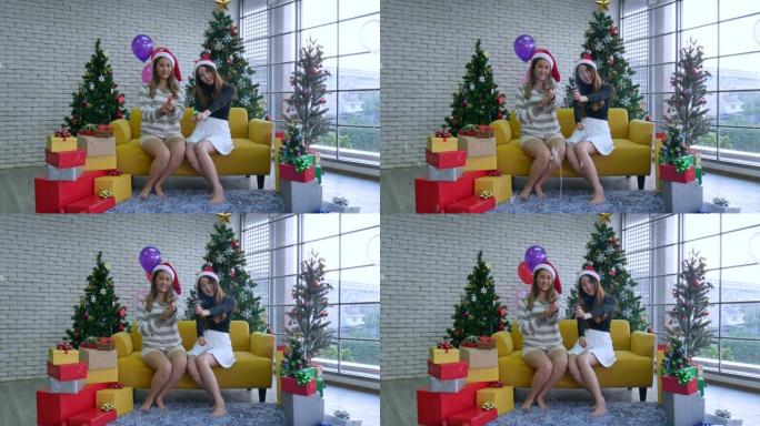 两名年轻的亚洲女性在庆祝圣诞节。
