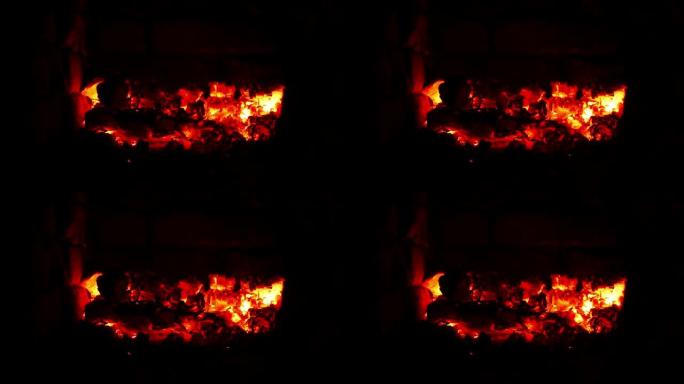 火箱里燃烧的火种的红色热量。篝火。