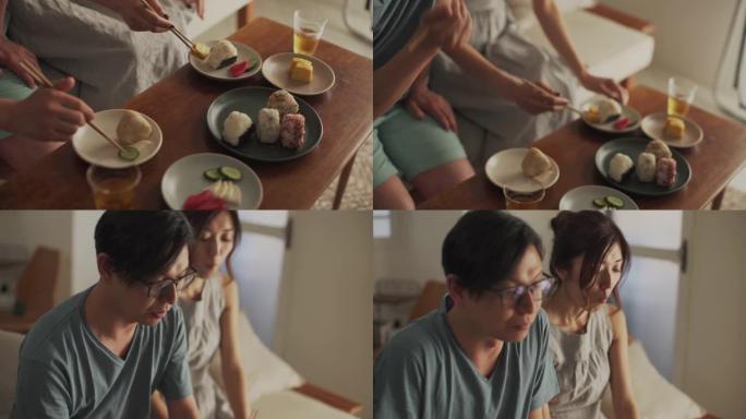 一对年轻夫妇在家用餐的特写镜头