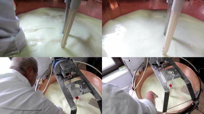 奶制品农场主用手混合山羊奶