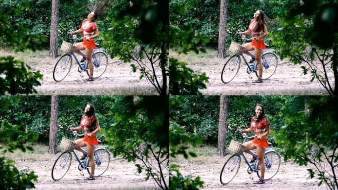 辫子。这个女孩有长发辫。在公园里骑自行车的女孩。