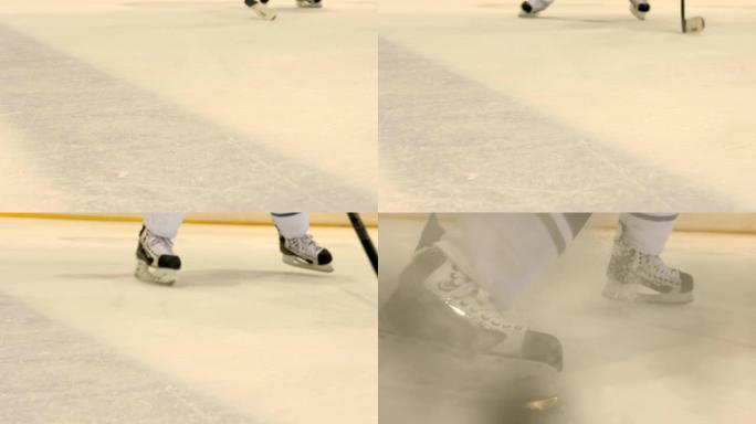 一名职业曲棍球运动员在冰上加速并在溜冰鞋上急刹车
