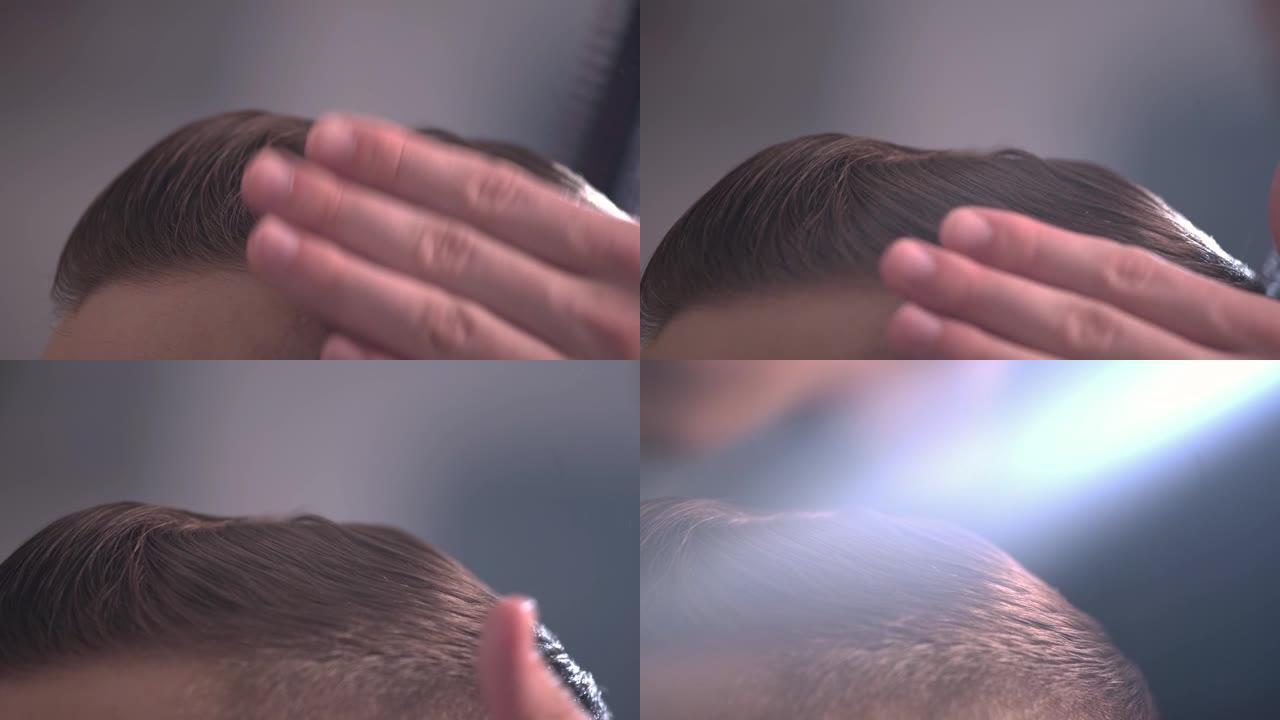 理发店或发廊的男士发型和理发。梳理头发。理发店