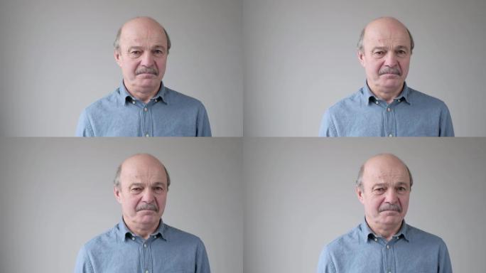 西班牙裔高级父亲对他的孩子的行为感到不满和疲倦。