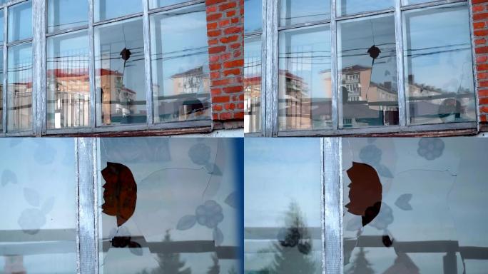 在幼儿园的窗户里，流氓用石头打碎了玻璃