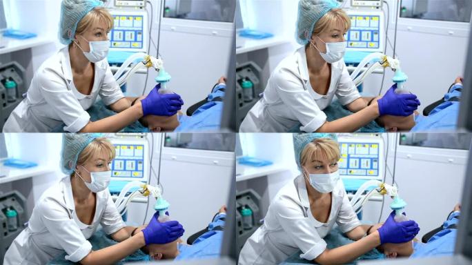 麻醉师在病人脸上戴着麻醉面罩。