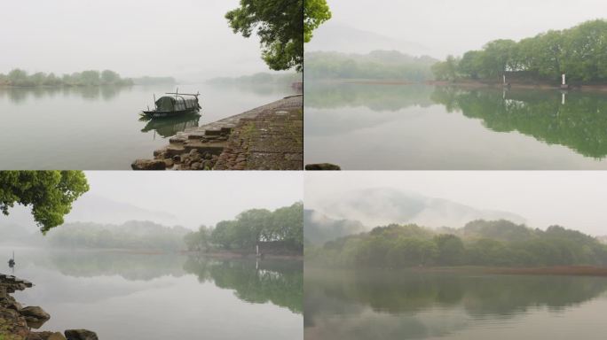 清明烟雨江南水乡古镇小船晨雾水面倒影