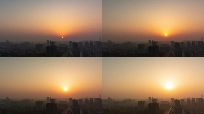 城市日出朝霞晨光红太阳升起城市逆光剪影