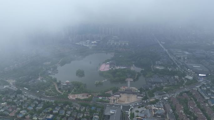 航拍西安芙蓉园穿云开场景区俯瞰春日绿意