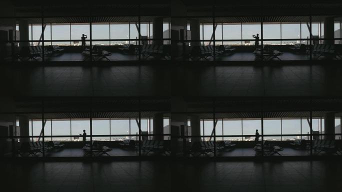 机场乘客剪影拍摄天空