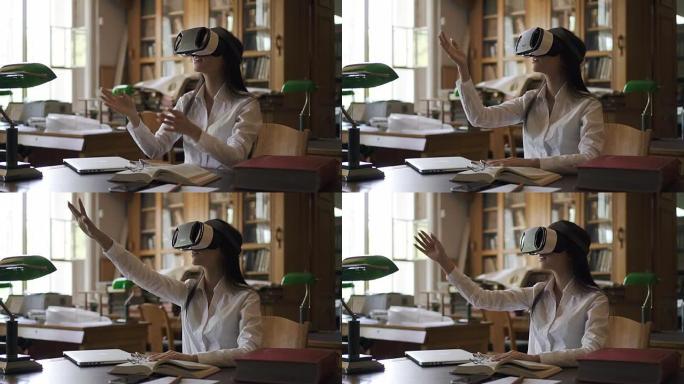 年轻女子脸上戴着虚拟现实眼镜，坐在图书馆里
