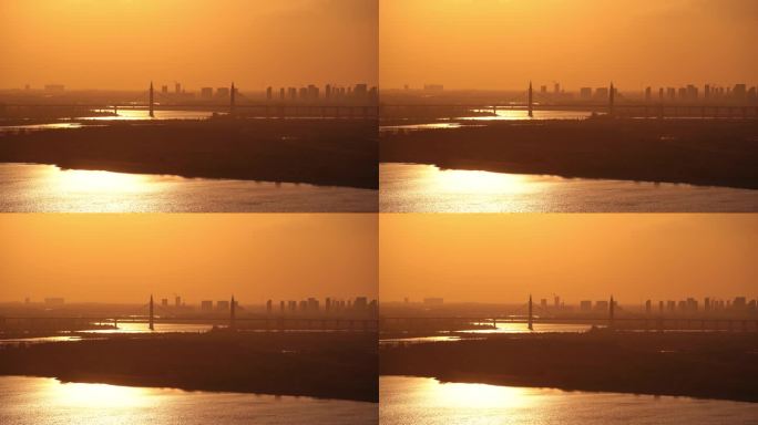 中国哈尔滨阳明滩大桥日落夕阳风光
