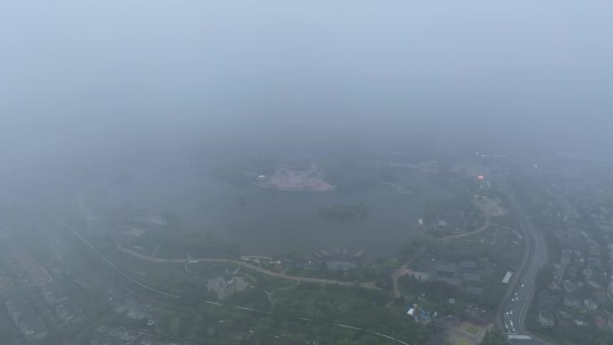 航拍西安芙蓉园穿云开场景区俯瞰春日绿意