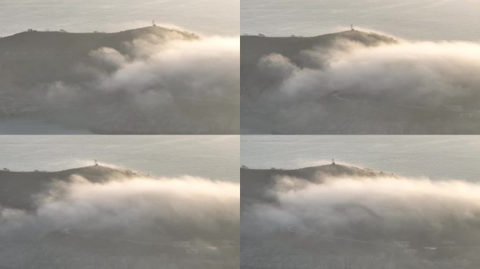 航拍清晨平流雾中的威海市远遥褚岛